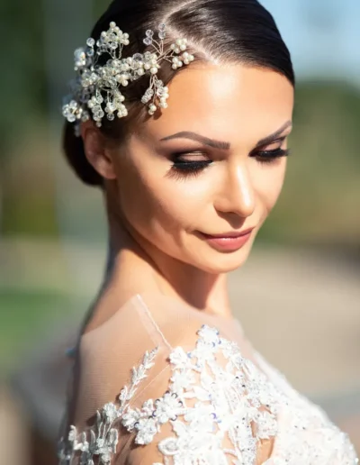 Bridal makeup with smokey eyes and soft nude lips