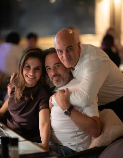Three guests posing together at a private Cape Town event