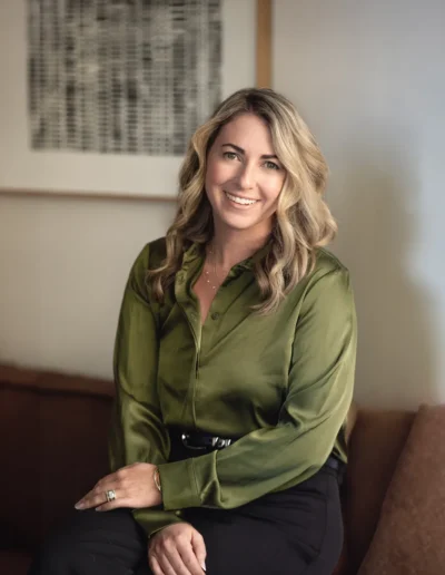 Professional businesswoman seated for a corporate portrait