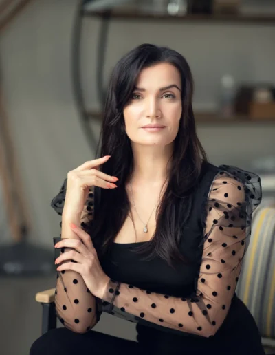 Professional brunette woman photographed for a corporate headshot