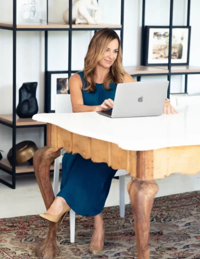 Businesswoman working on a laptop during a professional lifestyle shoot