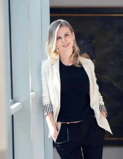 Professional businesswoman standing in a modern office environment