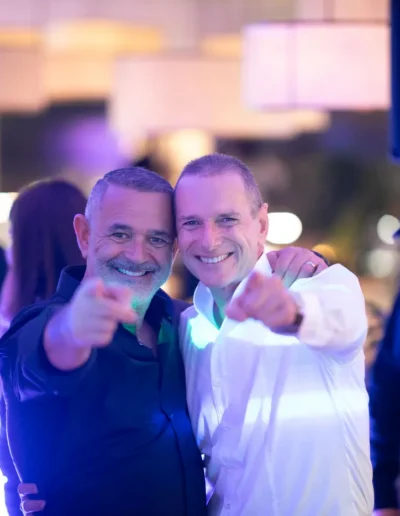Two guests celebrating together at a Cape Town private event