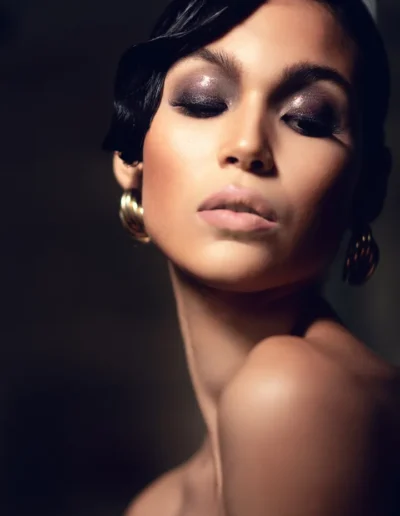 Glamour makeup with dark smokey eyes and nude lips