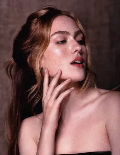 Natural beauty makeup highlighting freckles and glowing skin