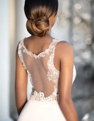Bride with sleek low bun bridal hairstyle